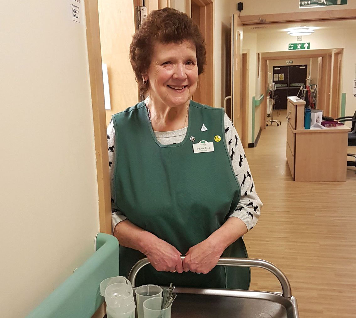 Pauline Dyke preparing to take tea and coffee to the Woodlands Hospice ward patients